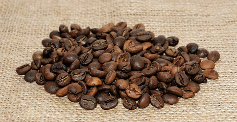 Coffee beans on a burlap.