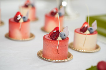 Tray with delicious cakes 