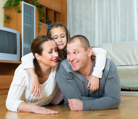 Portrait of mother, father and girl