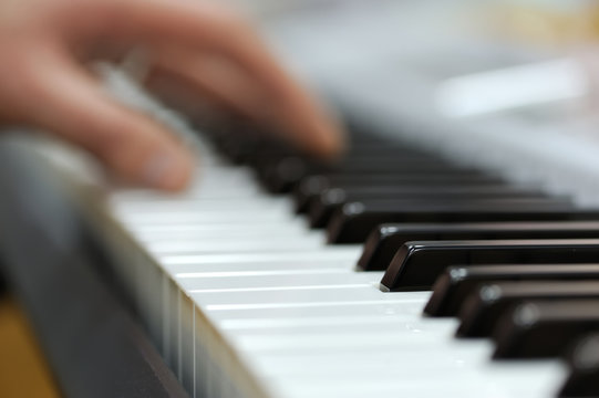 Piano with players hands