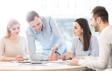 Fototapeta premium Pleasant team discussing a project