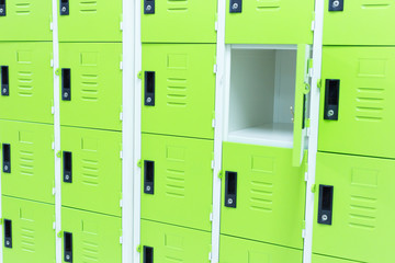 One locker open.Green locker.Green background.Different background concept.