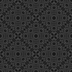 Black background with white geometric shapes.