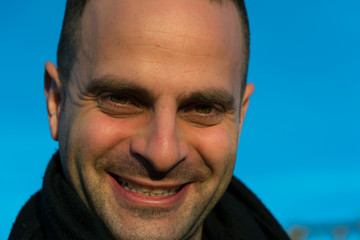 Portrait of happy man looking at camera