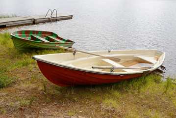 Naklejka premium Boats after rain. Northern Finland