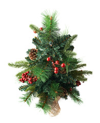 Fototapeta na wymiar Small artificial Christmas tree isolated