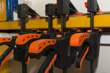hanging side by side plastic clamps