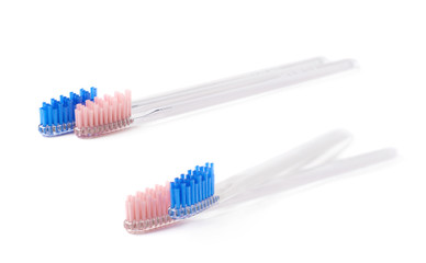 Composition of two toothbrushes