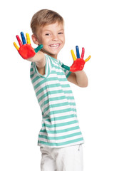 Little boy with paints on hands