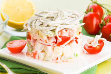 Russian cake salad with mayonnaise and tomatoes gulas