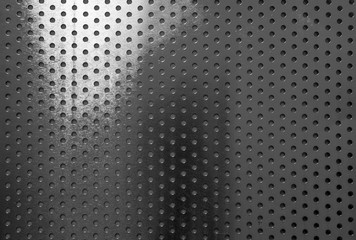 Black aluminum with circle patterns texture background