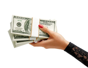 Womens Hand holding stacks of dollars banknotes isolated on white background. Business concept