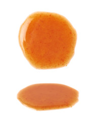 Puddle of a hot pepper sauce