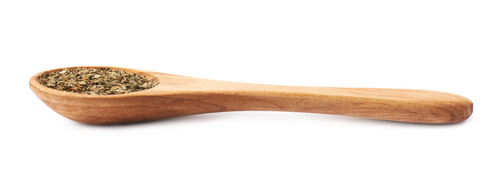 Wooden spoon and dried basil