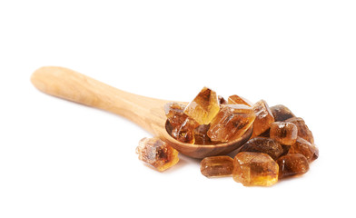 Wooden spoon full of sugar