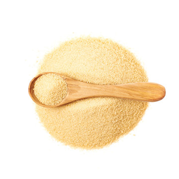 Spoon over pile of sugar