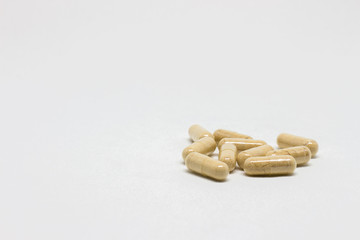 Pills on white background