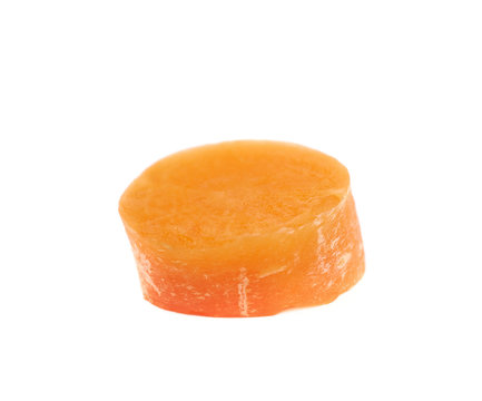 Single baby carrot slice isolated