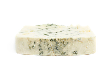 Slice of a blue roquefort cheese isolated