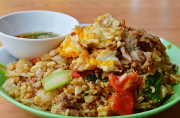 fried rice with egg and pork on dish