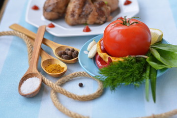 Fototapeta na wymiar Tomato, herb, chili, lemon, spice foreground