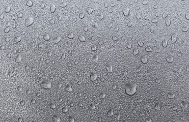 water drops on a metallic surface