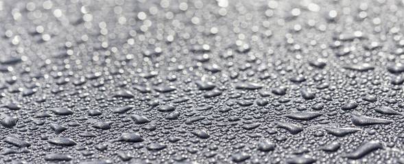 water drops on a metallic surface