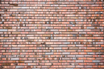 Red grunge brick wall background.