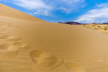 sand dune on a background of mountains