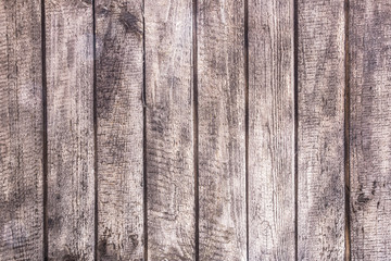 Old scratched grunge wooden wall background.
