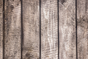 Scratched grunge wooden wall background.