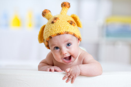 baby child in costume of giraffe