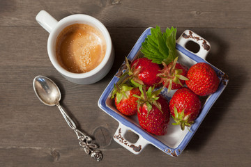 Nice summer breakfast: coffee and fresh strawberries