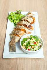 Deep fried fish with Thai salad.
