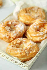 Sweet and tasty eclairs on a white background