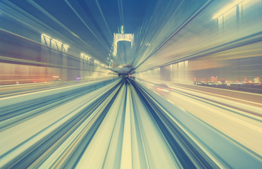 Fototapeta na wymiar High speed technology concept via a Tokyo monorail