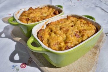 Baked or roasted egg pie or kind of quiche, french style snack baked in small roasting pan. Made from eggs, smoked ham, parsley, pork meat and bread. Traditional spring food in Czech Republic.