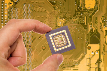 Microprocessor in hand over printed circuit board