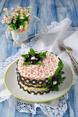 Salad with crab sticks, cheese, egg and prunes