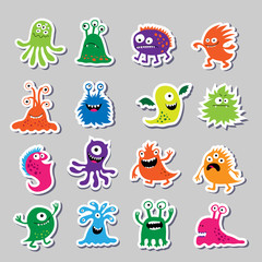 Set of cute monsters in the form of stickers