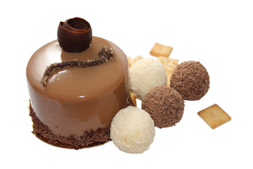 Chocolate cake with truffle candy and crackers (image with clipp