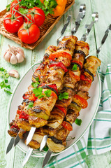 Skewers of pork and vegetables. Barbecuing lunch