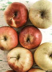 Apples on wooden background