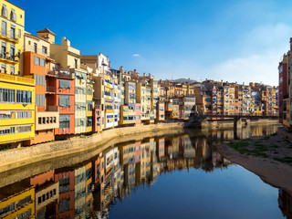 Colorful houses reflected in water, Girona, Catalonia, Spain