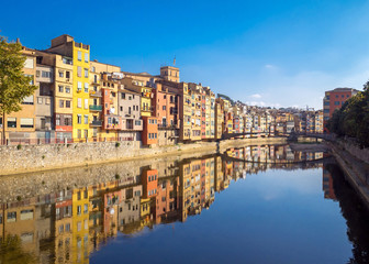 Fototapeta na wymiar Colorful houses reflected in water, Girona, Catalonia, Spain