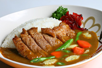 Yakiniku and mixed vegetables Curry Rice on white background