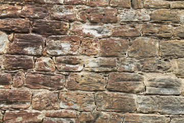Red stone wall textured background