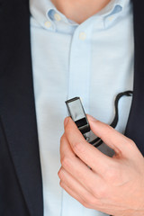 Businessman with whistle suggesting leadership or coaching training