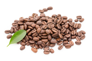 Coffee grains and leaves isolated on the white backgrounds.