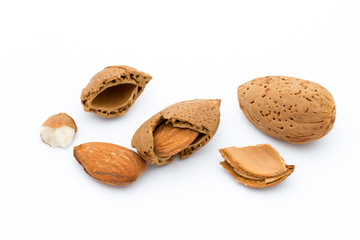 Group of almond nuts. Isolated on a white background.